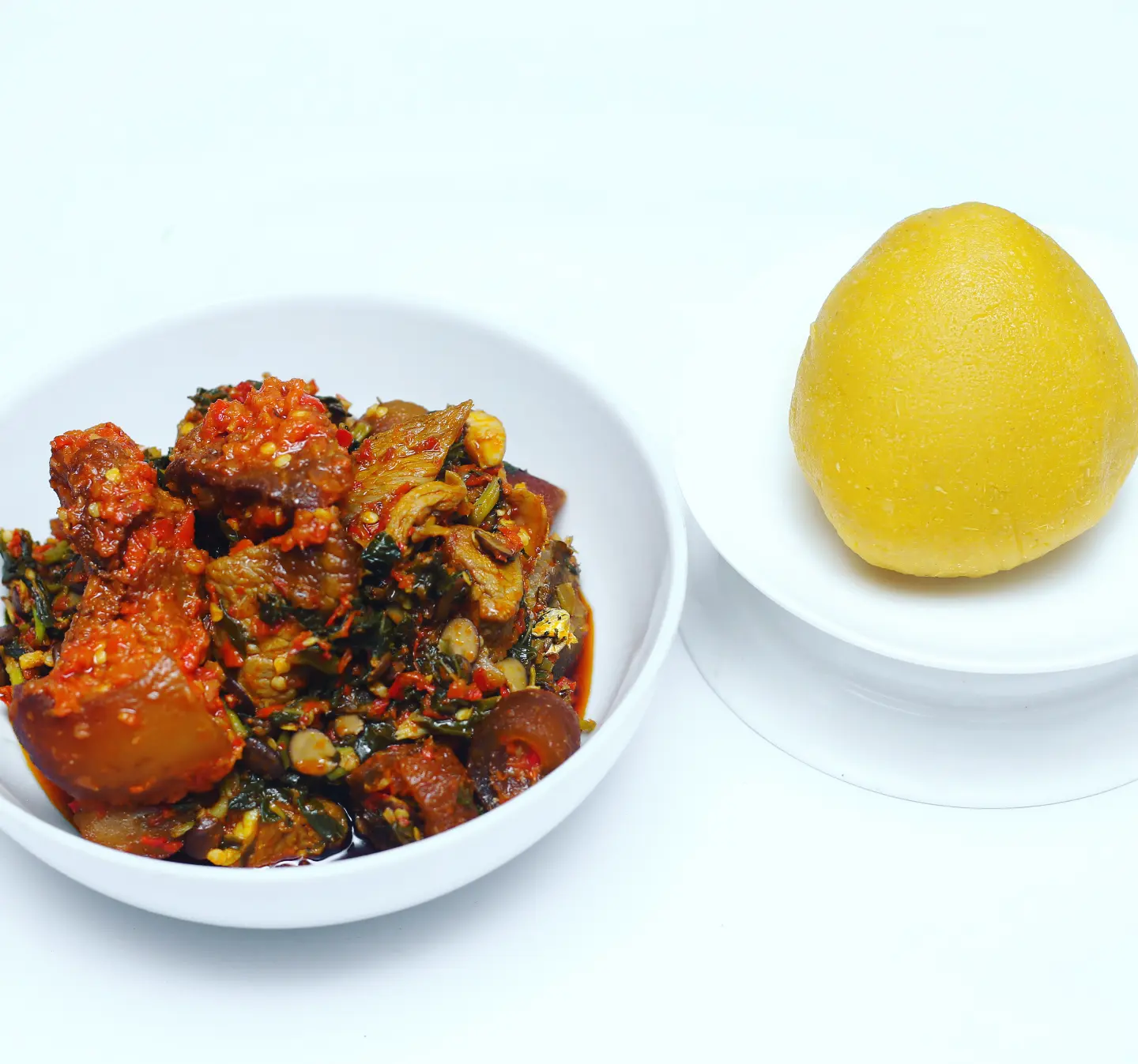 Yellow Eba with Spicy Assorted Efo Riro