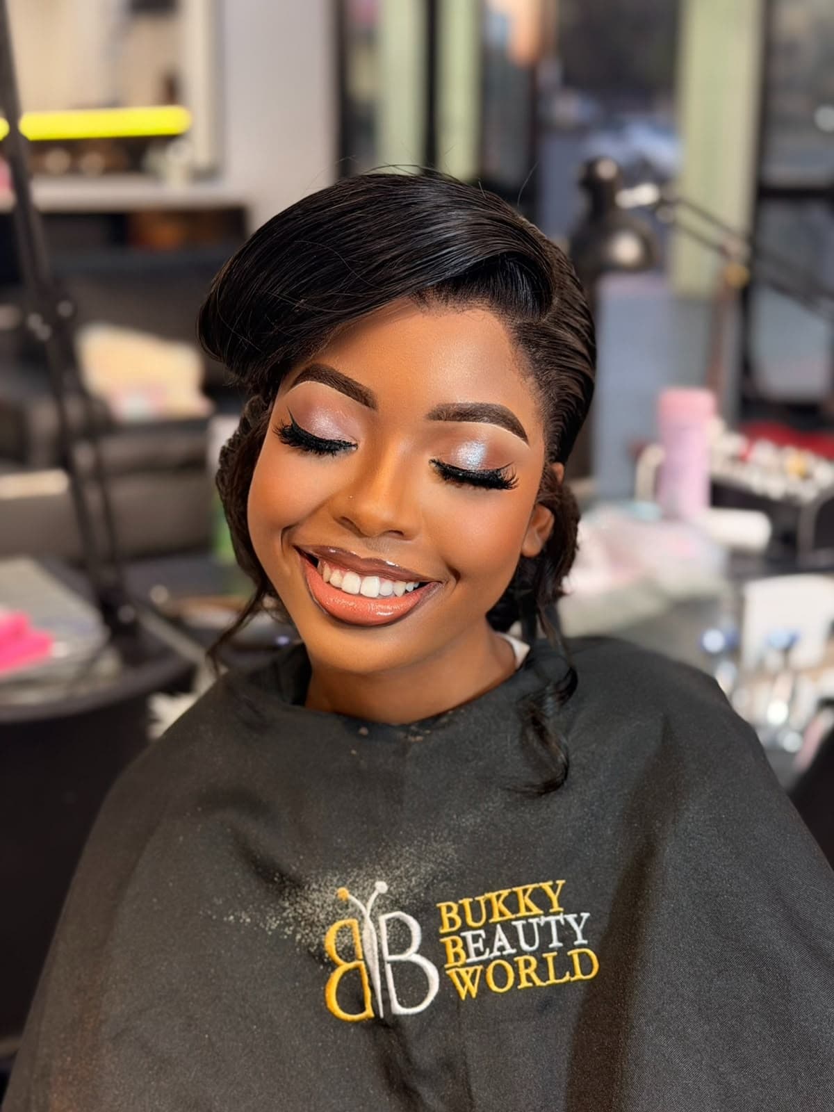 Dewy soft glam finish with pastel eye shimmer and radiant smile
