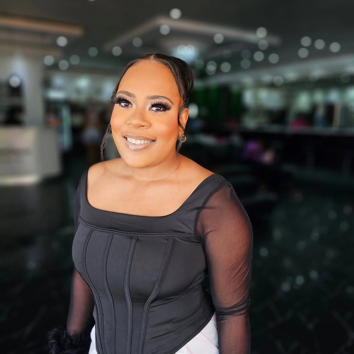 Flawless velvet foundation application with defined lip liner and radiant smile