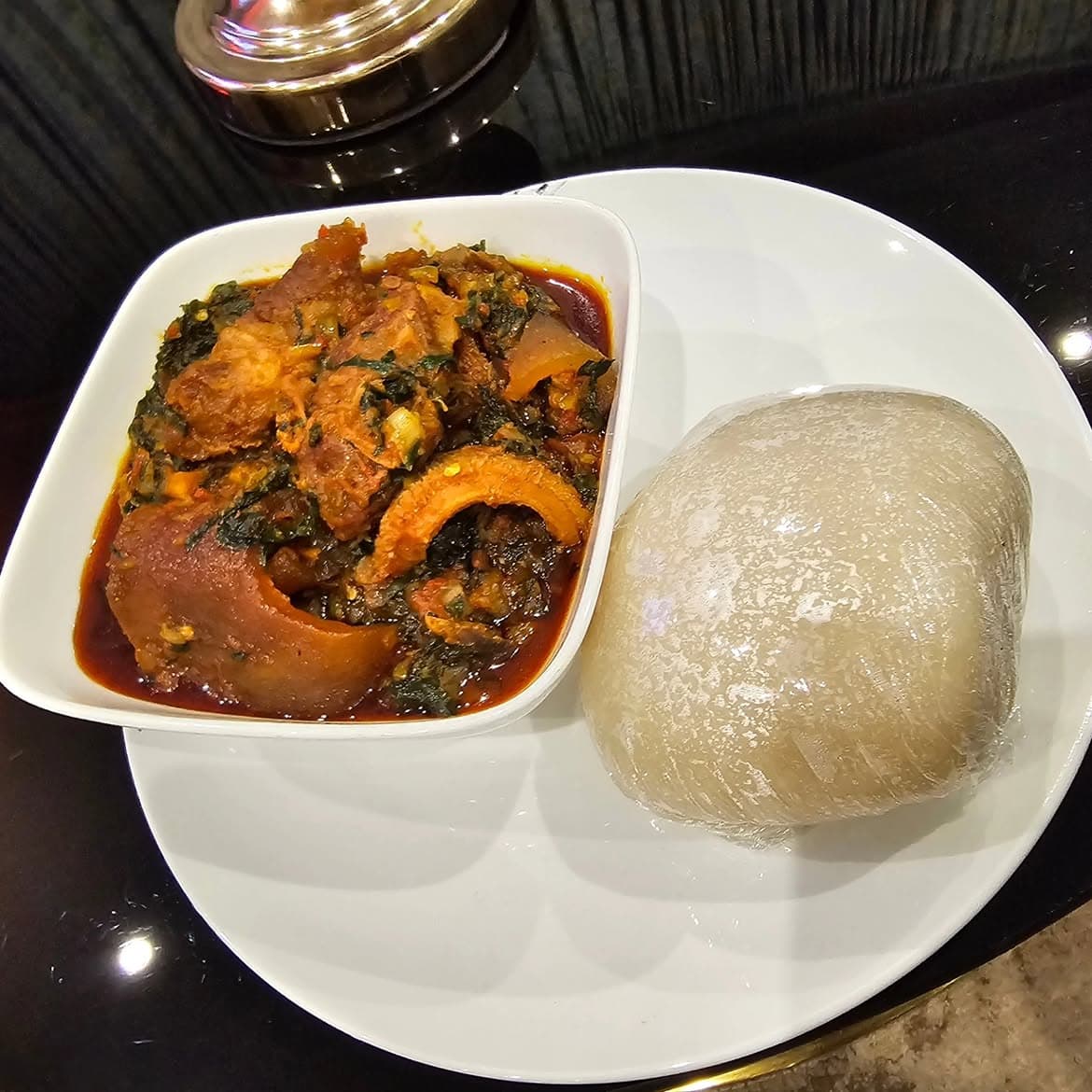Traditional Swallow with Stewed Assorted Meats